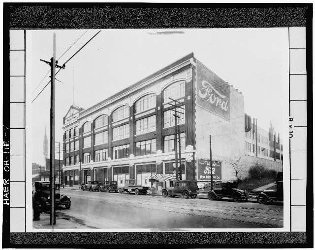 Photocopy of early 20th century photograph, looking east, of east facade of assembly building on Euclid Ave.