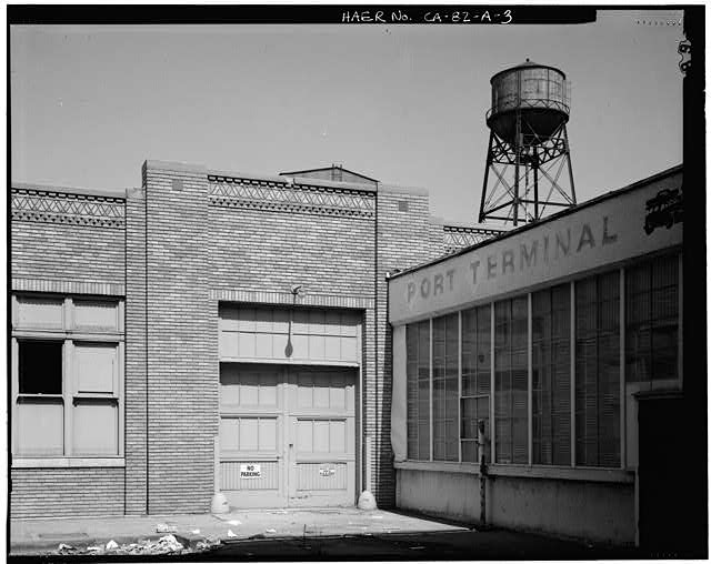 Ford Long Beach Assembly Plant DOOR NEAR END OF ASSEMBLY LINE, WITH WATER TOWER. VIEW TO EAST. 