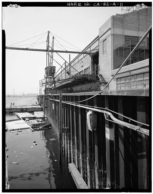Ford Long Beach Assembly Plant EAST SIDE OF DIKE, FACING SOUTH, SHOWING CRANES AND ELECTRICAL CAGE AT UPPER RIGHT. 