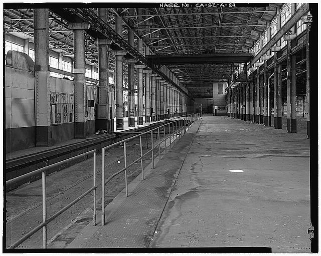 Ford Long Beach Assembly Plant LUNCH ROOM, SUNKEN RAIL SPUR, AND INTERIOR LOADING DOCK, FROM NEAR NORTH ENTRANCE TO PLANT. VIEW TO SOUTH. 
