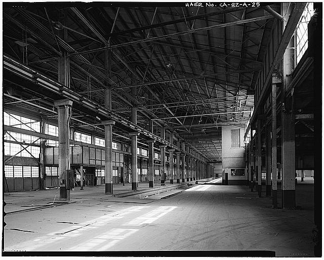 Ford Long Beach Assembly Plant LOOKING SOUTH-SOUTHEAST ALONG SUNKEN RAIL SPUR TO BOILER ROOM AND FREIGHT ELEVATOR. 