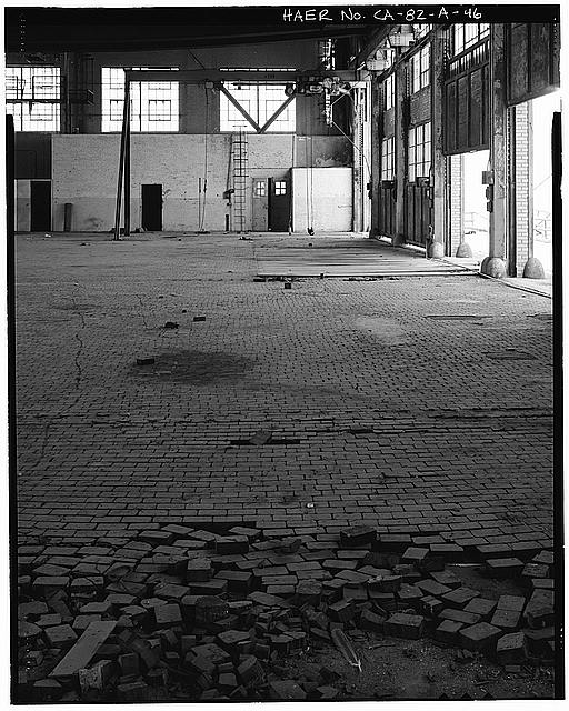Ford Long Beach Assembly Plant NORTHEAST CORNER OF SECOND FLOOR WAREHOUSE, WITH DETAIL OF WOODEN BLOCK FLOORING. VIEW TO NORTH. 