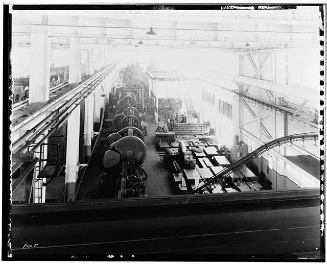 Ford Long Beach Assembly Plant Apr 24, 1931, INTERIOR-PRESSED STEEL BUILDING, EAST SIDE, SHOWING MECHANICAL SYSTEMS, PRESSED STEEL MACHINERY, CONVEYOR LINES 