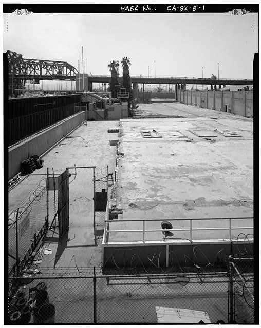Ford Long Beach Assembly Plant OIL HOUSE FOUNDATIONS, DIKE, AND PORTION OF SOUTH FRONT OF MAIN ASSEMBLY PLANT. VIEW TO WEST.
