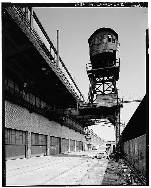 Ford Long Beach Assembly Plant REAR OF CRANE, DIKE, AND SECOND FLOOR DECK FROM RAIL SPUR. VIEW TO NORTH. 