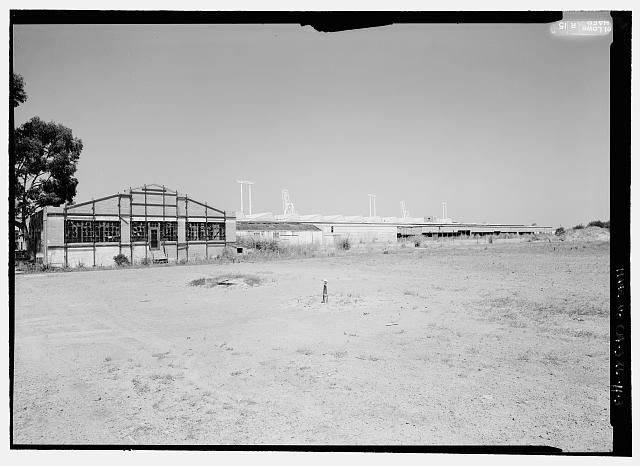 Ford Richmond Assembly Plant VIEW TO WEST SHOWING EAST END OF OIL HOUSE (LEFT) AND EAST SIDE OF CRATING SHED AND ASSEMBLY BUILDING (RIGHT BACKGROUND).