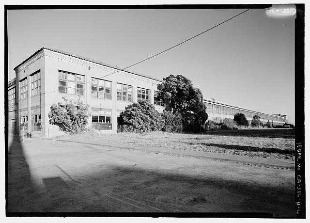Ford Richmond Assembly Plant PERSPECTIVE VIEW TO SOUTHWEST SHOWING NORTHWEST CORNER OF ASSEMBLY BUILDING WHERE SHOWROOMS (FIRST FLOOR) AND OFFICES (SECOND FLOOR) WERE LOCATED. WEST SIDE OF ASSEMBLY AREA IS TO RIGHT.