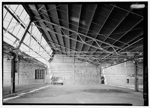 Ford Richmond Assembly Plant VIEW TO EAST SHOWING ONE OF THE OPENINGS IN THE SECOND FLOOR EAST WALL THROUGH WHICH A CONVEYOR ONCE PASSED FOR MOVING BODY PANELS TO AND FROM THE SECOND FLOOR.
