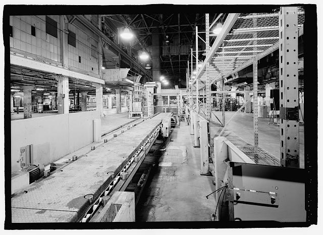 Ford River Rouge Plant B Building SOUTHERN END OF ASSEMBLY PLANT, LOOKING N ON SECOND FLOOR, WHICH DID NOT EXIST ON DURING SHIP BUILDING DAYS. NOTE VEHICLE ELEVATOR. ABOVE AND TO THE LEFT IS SHIP BUILDING BALCONY. 