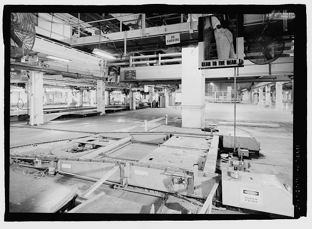 Ford River Rouge Plant B Building LOOKING SOUTH BETWEEN X5 AND X6 AT COLUMN 71, SOUTH END OF ASSEMBLY PLANT ON SECOND FLOOR. CAR CONVEYOR WITH GEAR TO THE REAR SIGN.