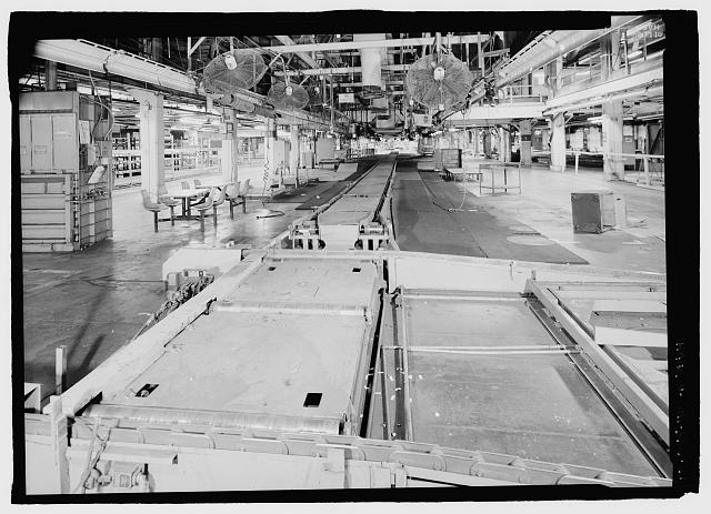Ford River Rouge Plant B Building SOUTH END, LOOKING NORTH AT CONVEYOR LINE BETWEEN X5 AND X6 AT COLUMN 71, SECOND FLOOR. NOTE WORKERS TABLES.