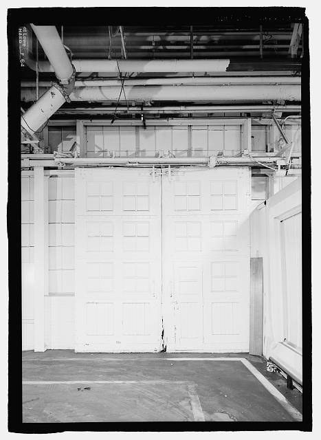 Ford River Rouge Plant B Building FIRST FLOOR, LOOKING S, ORIGINAL DOORS. NORTH END OF HISTORIC ALBERT KAHN-DESIGNED BUILDING.